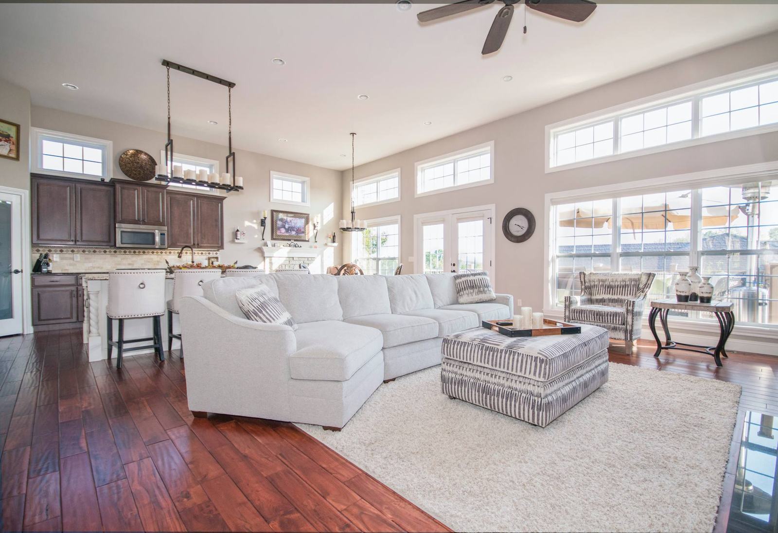 Open-plan living room with a white sectional sofa