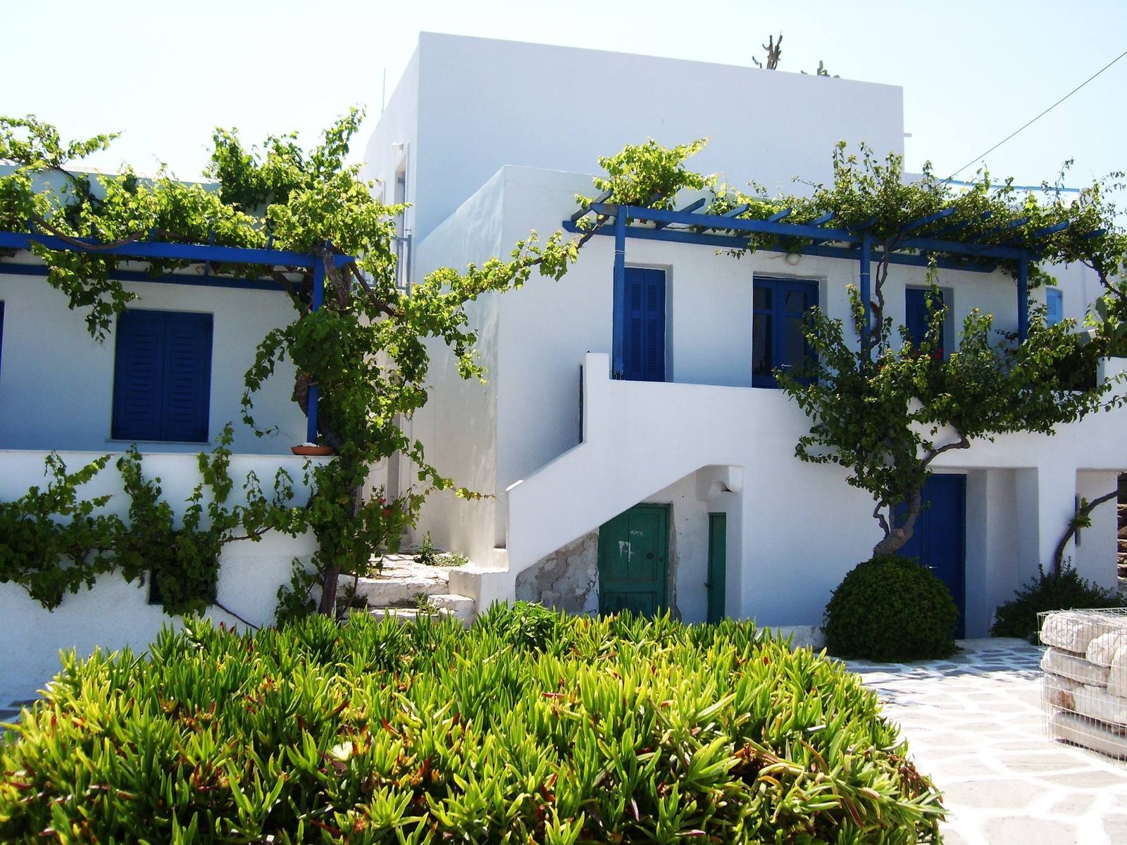 White Mediterranean houses with planted terraces