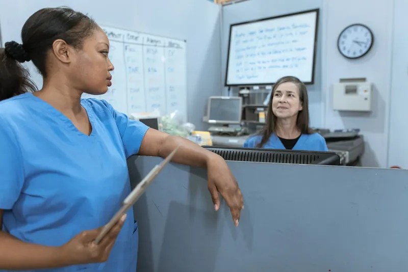Nurses discussing a care plan