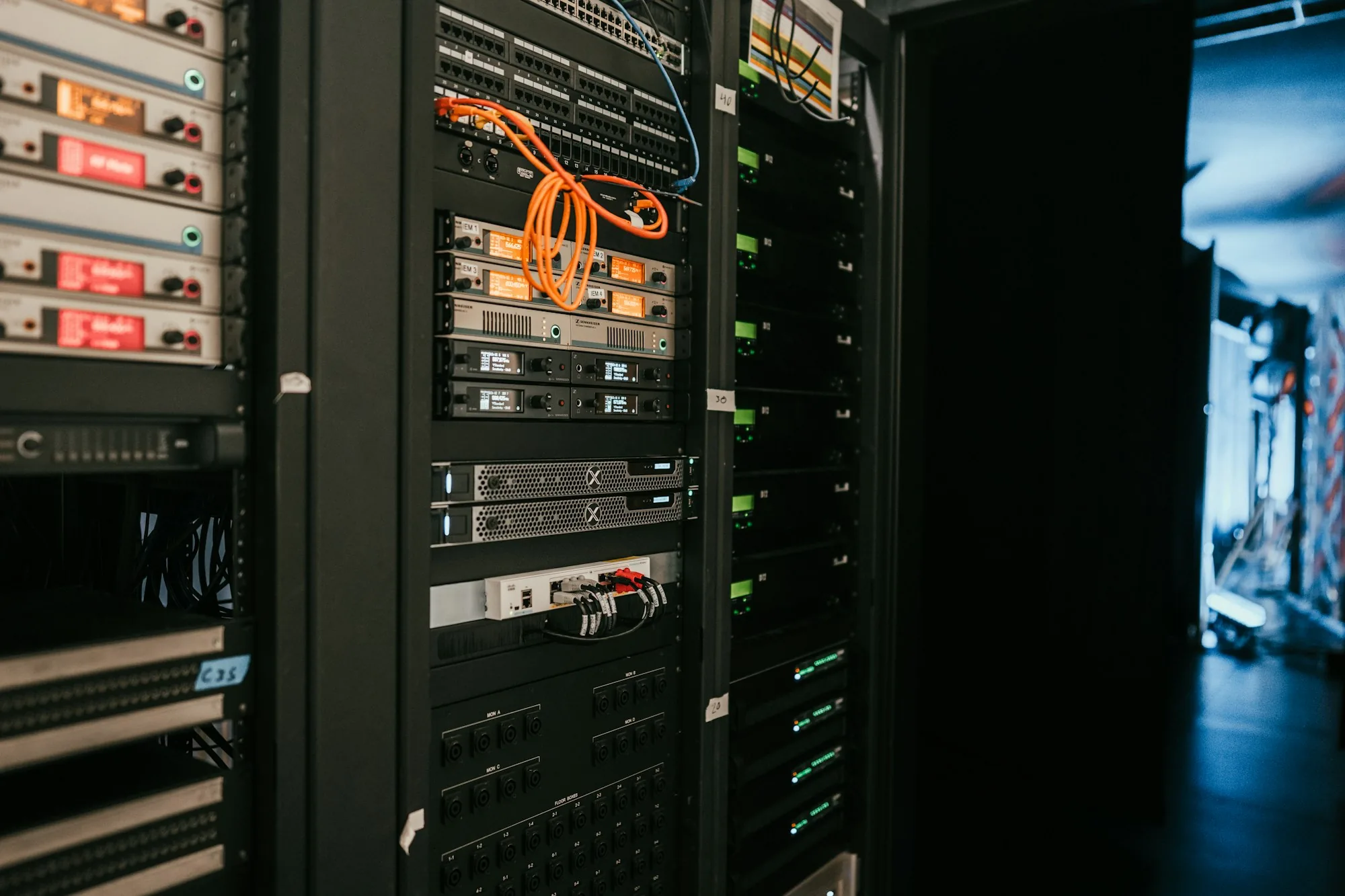 Aisle of server racks in a data centre
